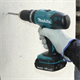 Perceuse-visseuse à percussion Makita DHP453RFJ 2x3.0Ah