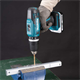 Perceuse-visseuse à percussion Makita HP488D008 2x2.0Ah